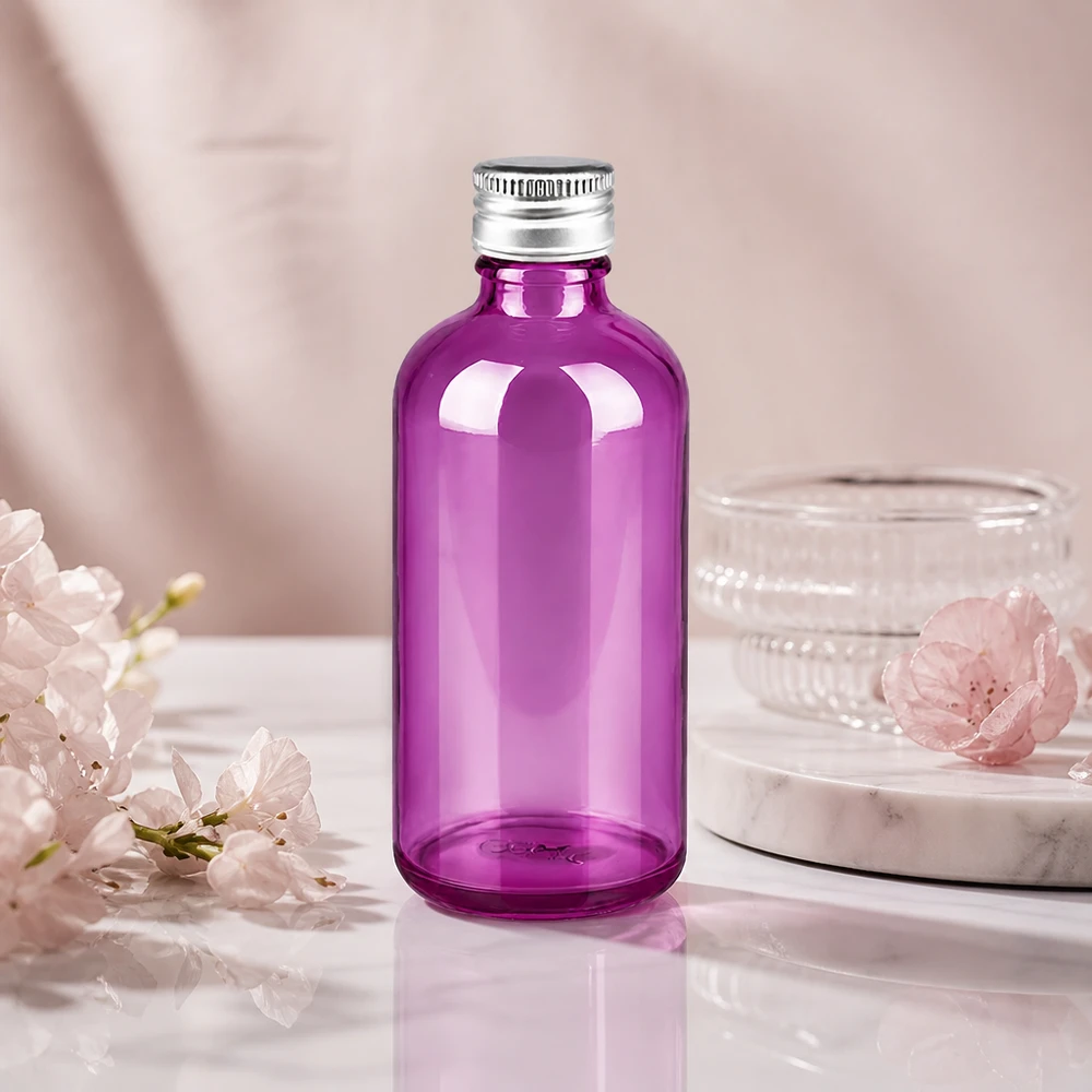 Petit flacon en verre de 100 ml d'un violet vif, parfait pour les formats de voyage et les échantillons.