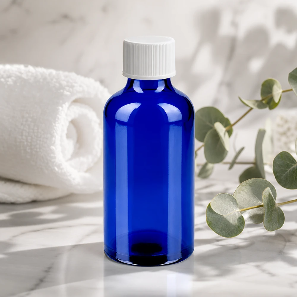 Flacon de 50ml 11mm SV blanc STD BlueLine UT18/50 Bouteille en verre brun Premium de 50 ml teintée en bleu pour une conservation et une fraîcheur optimales du produit