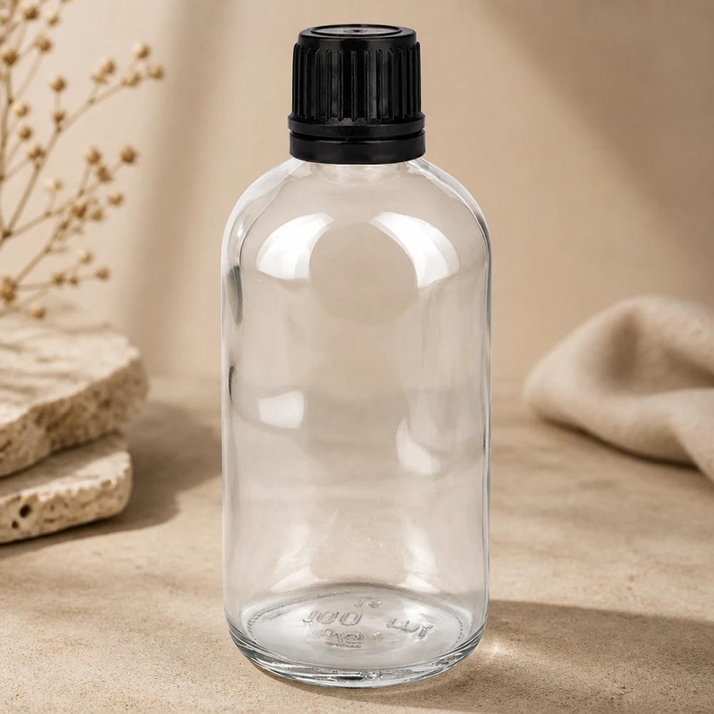 Flacon de 100ml (globule). 3mm GR s. STD ClearL. UT18/100 Flacon de pharmacie en verre transparent de 100 ml avec bouchon à vis noir à l'épreuve des enfants