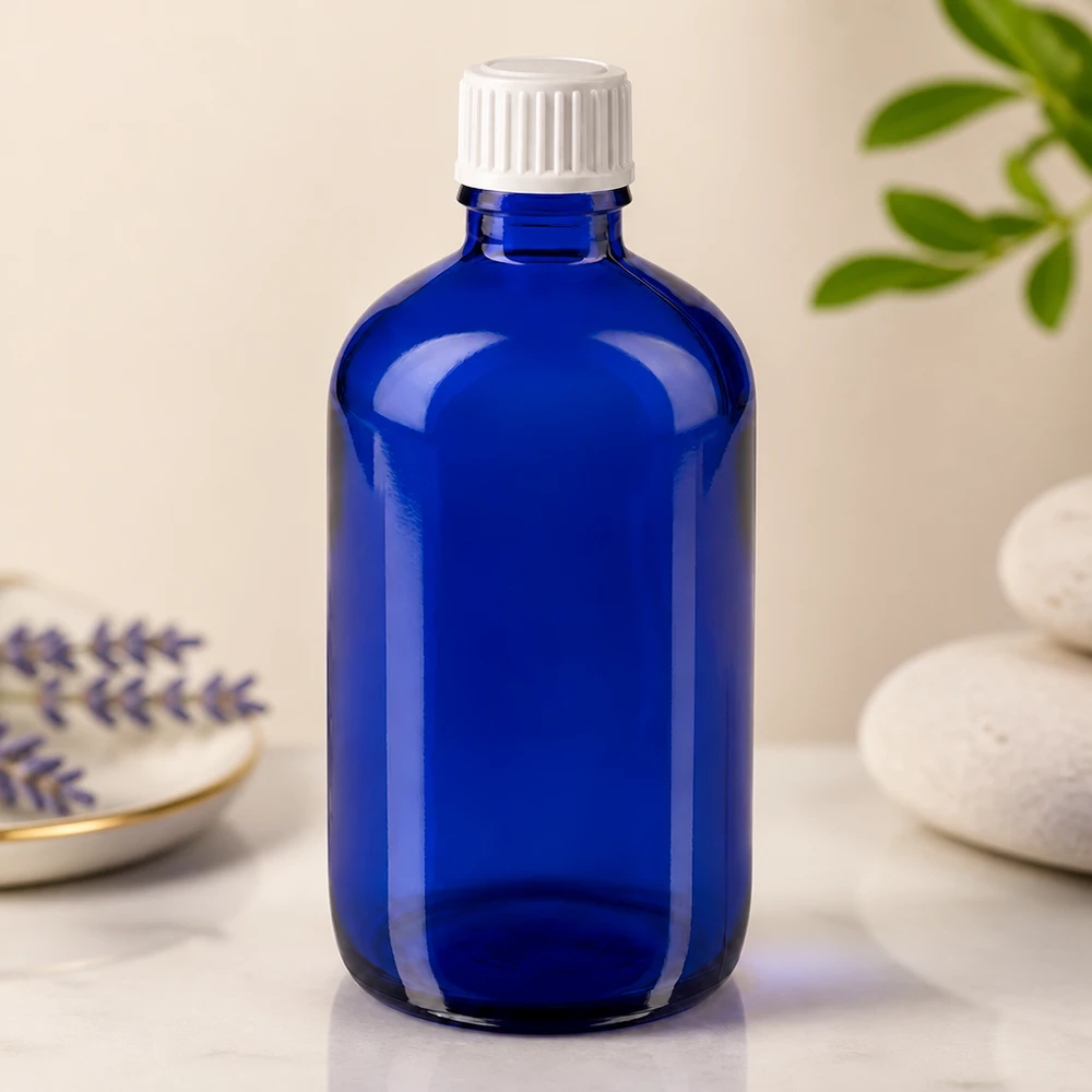 Flacon de pharmacie bleu cobalt de 100 ml, en verre anti-UV, avec bouchon standard blanc de 11 mm