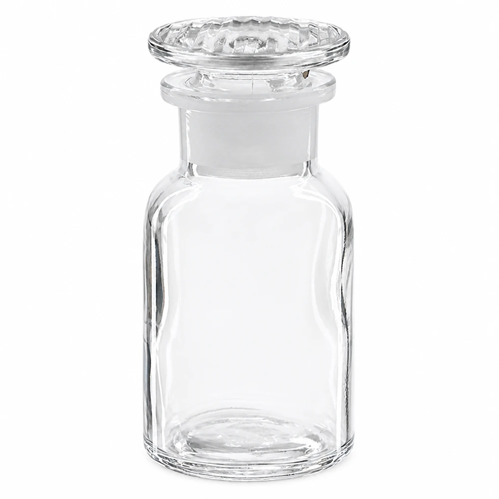 Flacon pharmaceutique 100 ml col large + bouchon verre clair Flacon de pharmacie transparent à col large de 100 ml, muni d'un bouchon taillé pour un stockage en toute sécurité