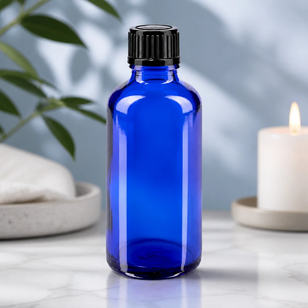 Flacon à pharmacie bleu 50ml bouchon compte-gouttes 1mm noir std Flacon en verre bleu de 50 ml avec un orifice de dosage de 1 mm pour les huiles essentielles et l'aromathérapie