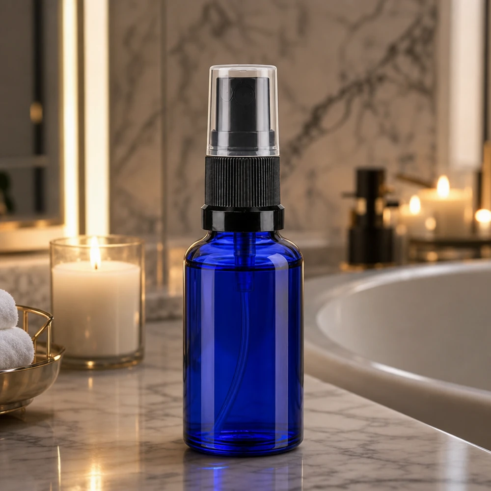 Flacon à pharmacie bleu 20ml embout spray noir Flacon pulvérisateur cylindrique de 20 ml, en verre bleu, avec pompe noire et capuchon de protection transparent