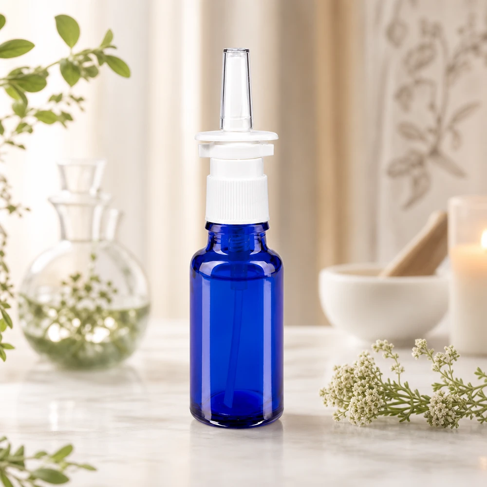 Flacon à pharmacie bleu 20ml vaporisateur nasal blanc standard Flacon compact de spray nasal de 20 ml en verre anti-UV bleu cobalt, muni d'un embout pulvérisateur blanc
