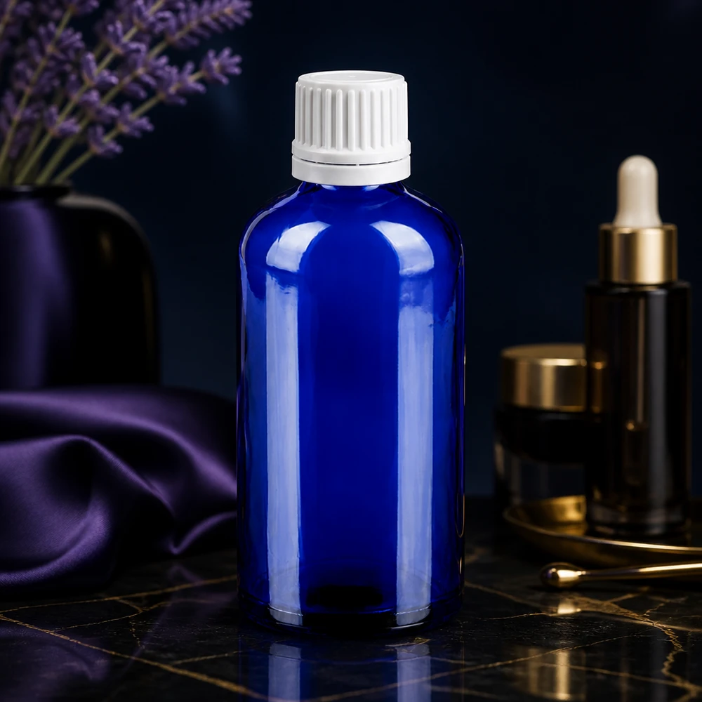 100ml flacon compte-gouttes 0.7mm blanc OV BlueLine UT18/100 Flacon compte-gouttes précis de 100ml en verre bleu anti-UV avec bouchon blanc pour le laboratoire et la pharmacie