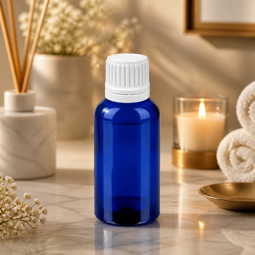 Flacon compte-goutte 30ml 0.7mm blanc OV BlueLine UT18/30 Bouteille bleue de 30 ml avec compte-gouttes, idéale pour les huiles essentielles et le bricolage cosmétique.