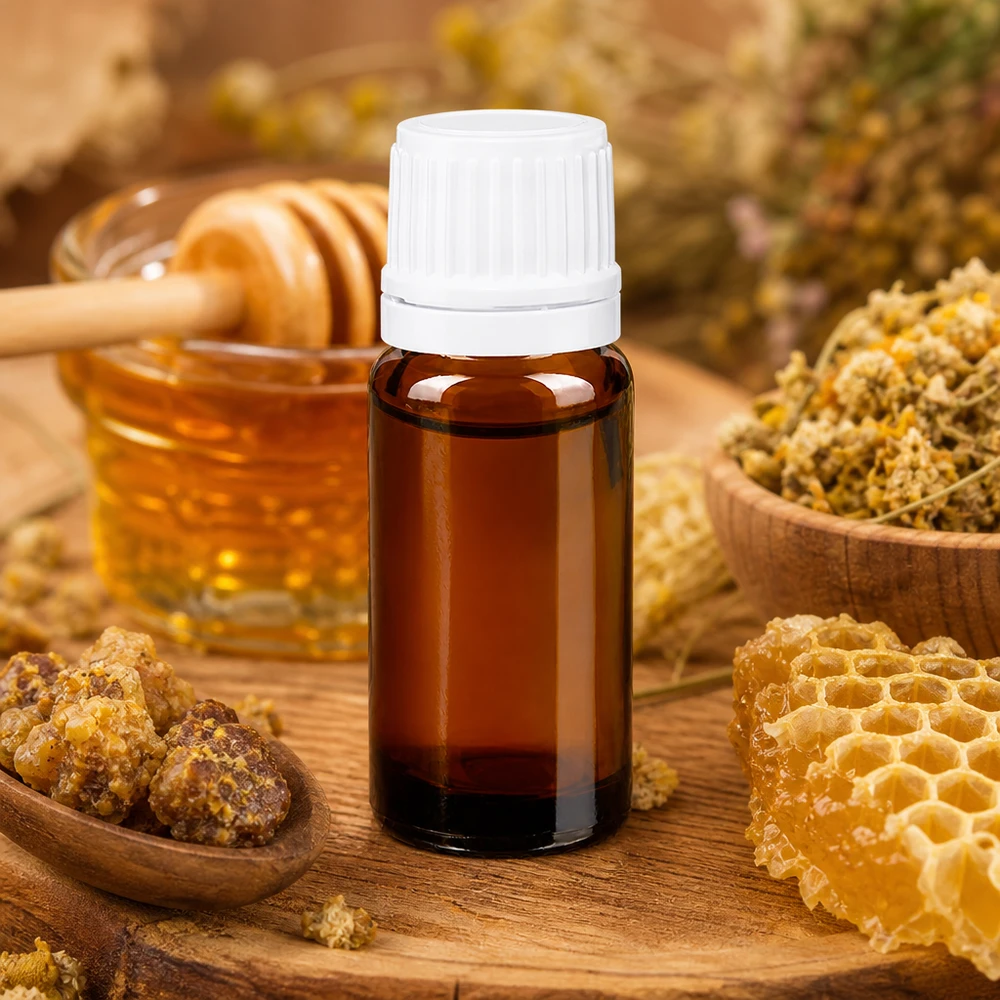 Flacon pour produits naturels de 10 ml, en verre ambré avec bouchon blanc, idéal pour la propolis et les produits apicoles