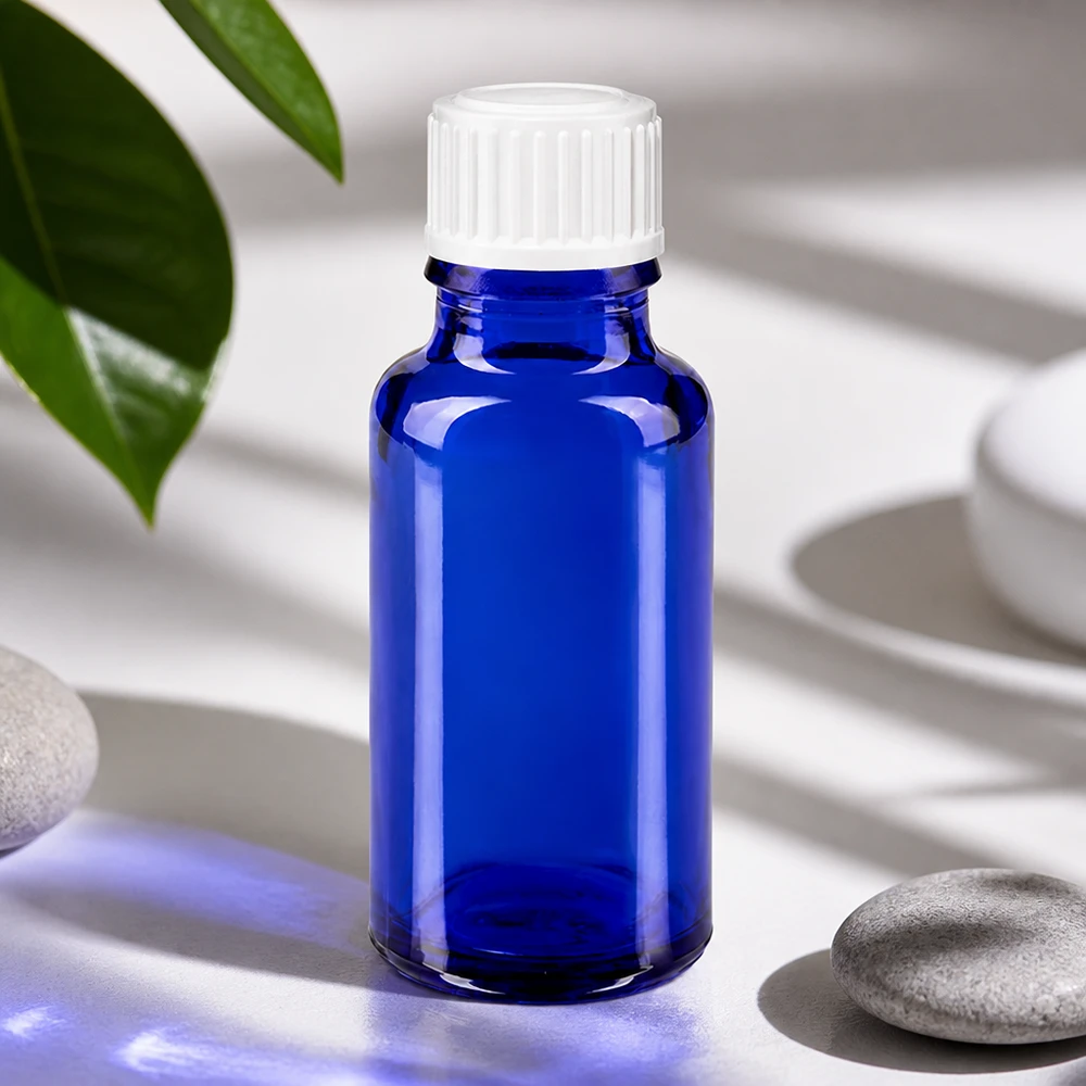 Flacon à pharmacie bleu 20ml bouchon à vis blanc standard Flacon de pharmacie compact de 20 ml en verre bleu, muni d'un bouchon blanc de sécurité enfant de 11 mm