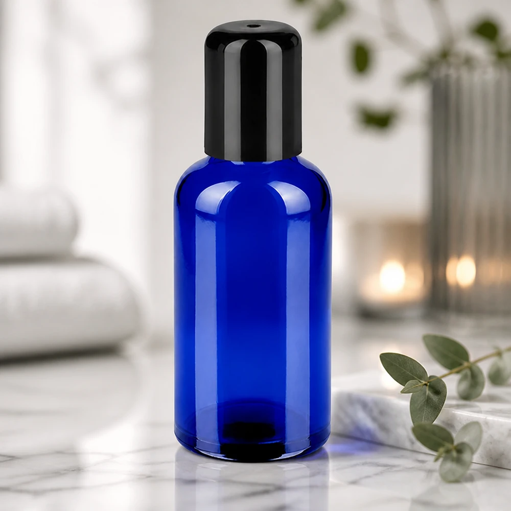 Flacon Roll-On 50ml noir STD BlueLine UT18/50 Flacon Roll-On 50ml STD BlueLine UT18/50 en verre bleu robuste avec dosage précis
