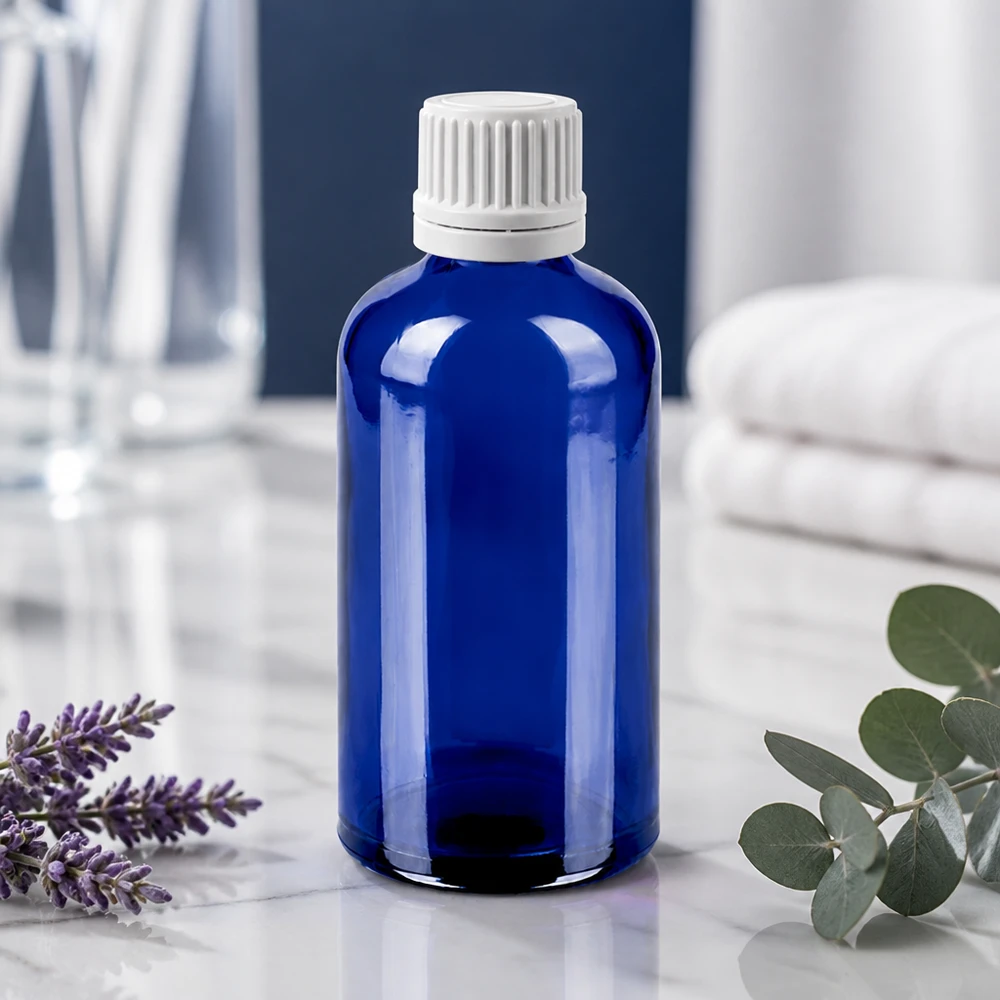 100ml flacon compte-gouttes 0.7mm blanc OV BlueLine UT18/100 Flacon compte-gouttes précis de 100 ml en verre bleu robuste avec bouchon blanc à l'épreuve des enfants