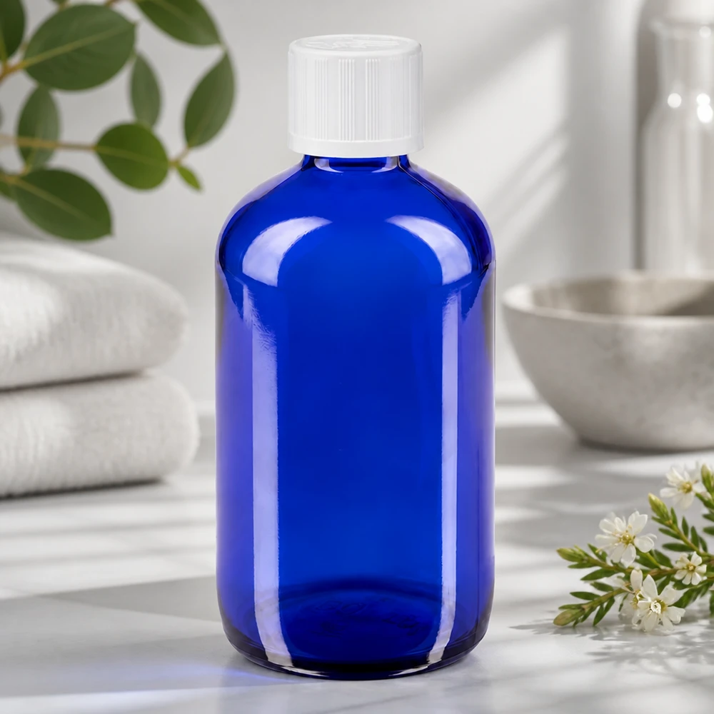 Flacon de pharmacie bleu 100ml bouchon compte-gouttes blanc sécurité enfant std Flacon de pharmacie opaque 100 ml, bleu, avec bouchon KiSi blanc, pour huiles essentielles