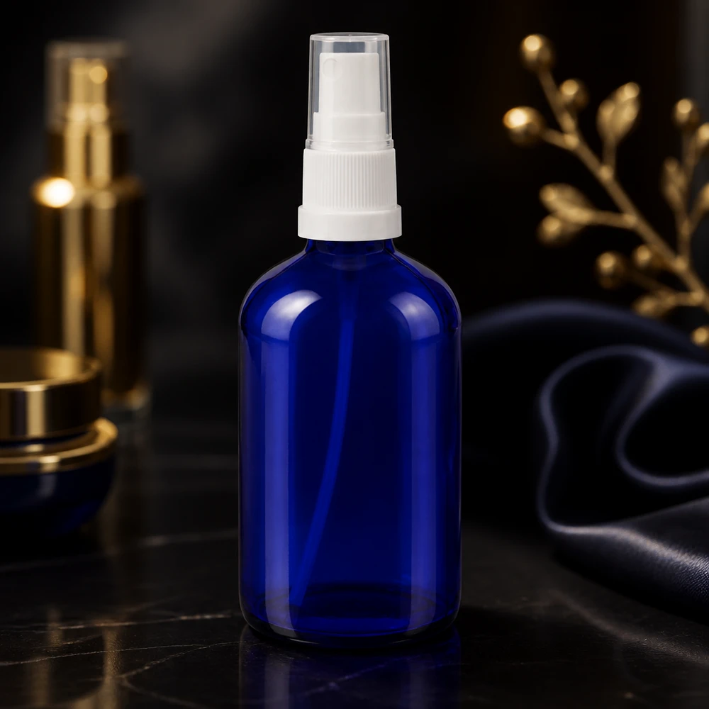 Flacon de pharmacie bleu 100ml embout spray blanc Flacon de pharmacie bleu rond de 100 ml avec pompe-vaporisateur STD blanche pour sérums et toniques
