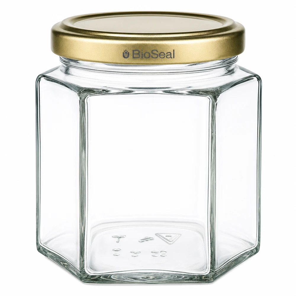 520g pot de miel hexagonal transparent avec couvercle BioSeal doré pour apiculteur et mise en pot du miel