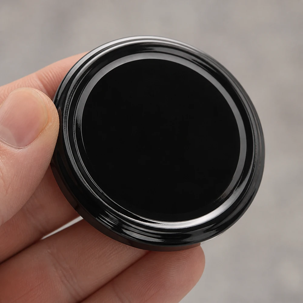 Poignée à doigt pour couvercle BasicSeal TO70 noir, 70 mm, structure filetée UNiTWIST sur le côté
