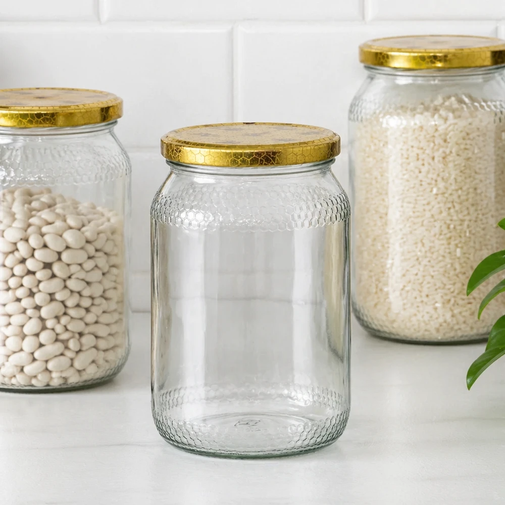 Pots à miel de 900 ml avec couvercle en nid d'abeille BasicSeal organisés comme bocaux de stockage pour les haricots et le riz dans le Pantry