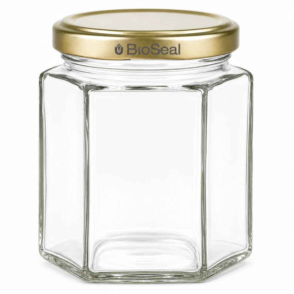 Pot à miel 250 g avec couvercle doré BioSeal UNiTWIST Pot de miel hexagonal de 250g avec couvercle à visser BioSeal doré vide transparent Conserve de miel en verre