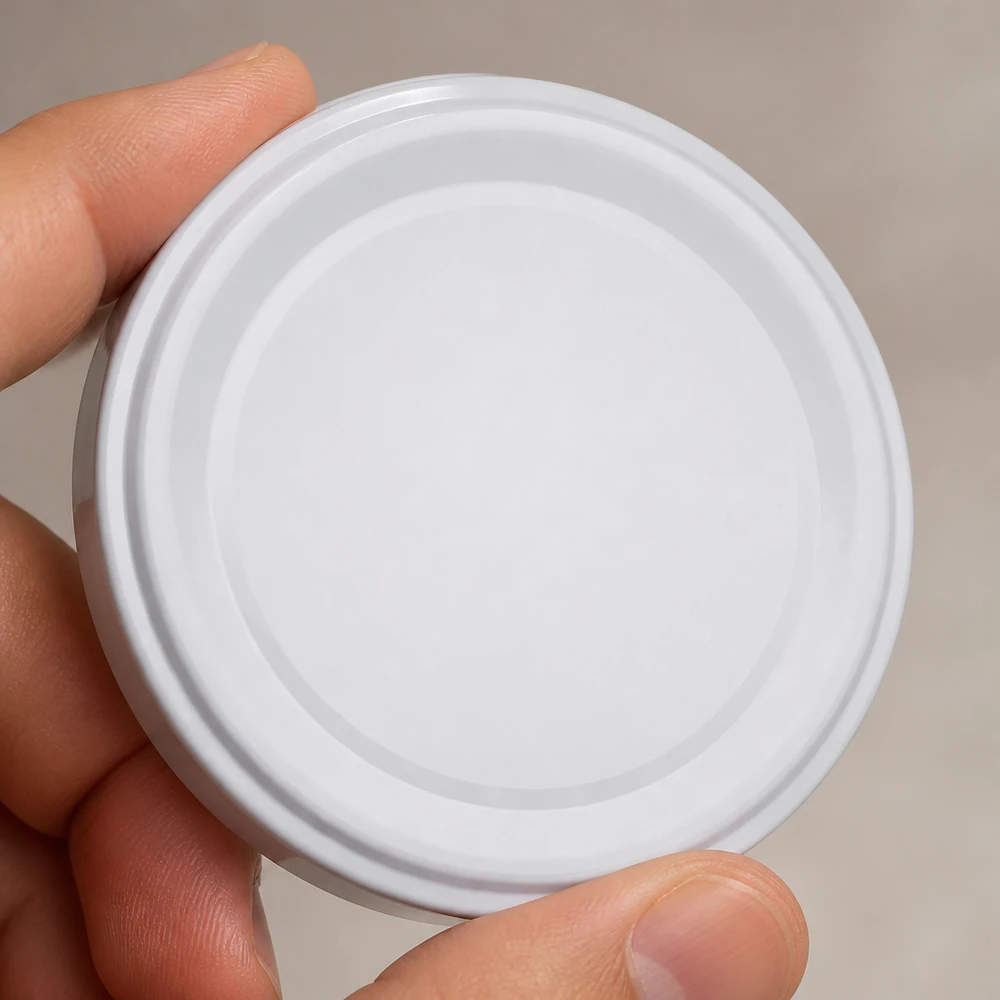 Couvercle BasicSeal 66 mm blanc TO66deep UNiTWIST : le couvercle à vis rond se visse par le haut