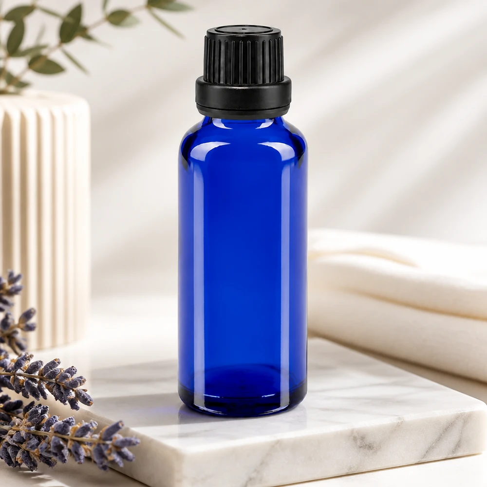 Flacon de pharmacie bleu 30ml bouchon compte-gouttes 2mm noir bouchon inviolabilité Flacon en verre bleu cobalt de 30 ml avec bouchon à vis noir, destiné à l'aromathérapie et aux huiles essentielles