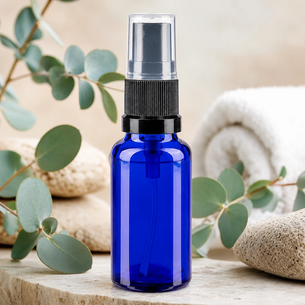 Flacon à pharmacie bleu 20ml embout spray noir Flacon de pharmacie de 20 ml en verre bleu, muni d'un vaporisateur à brume fine, destiné aux soins cosmétiques et à l'aromathérapie