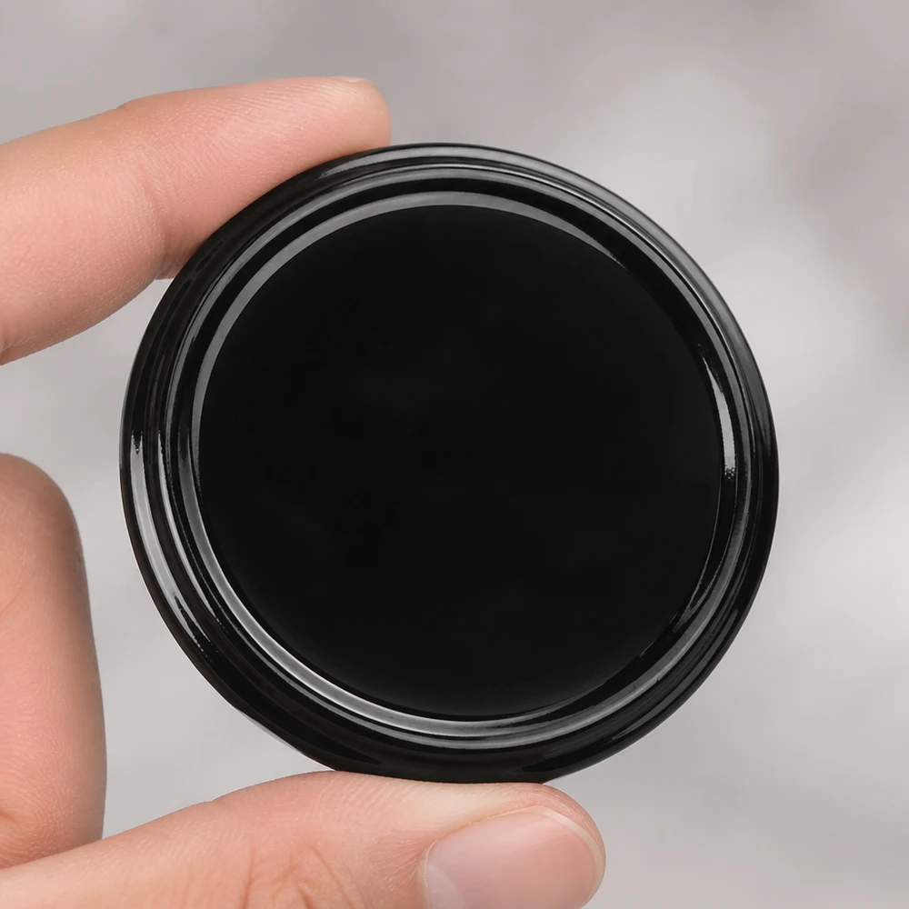 Couvercle de bocal rond TO82 de 82 mm, noir UNiTWIST, à tenir entre le pouce et l'index