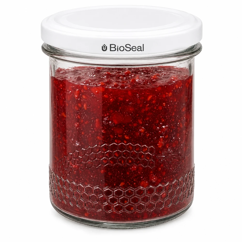 BioSeal pot de 400ml rempli de confiture rouge montre une fermeture hermétique et un gaufrage en nid d'abeille sur le bord du pot