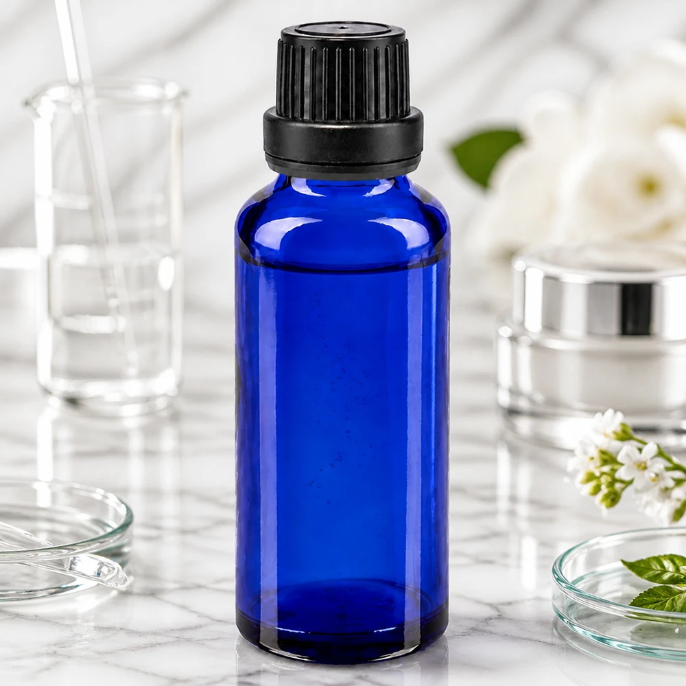 Flacon de pharmacie bleu 30ml bouchon vissable noir bouchon inviolabilité Petit flacon en verre bleu de 30 ml avec bouchon OV noir, pour sérums et produits cosmétiques