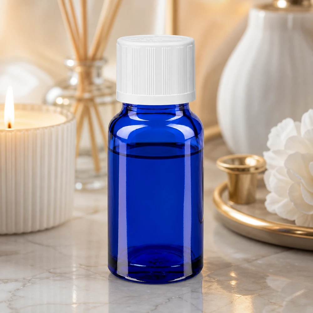 Flacon compte-gouttes de 10 ml en verre de pharmacie bleu cobalt, muni d'un bouchon blanc à sécurité enfants