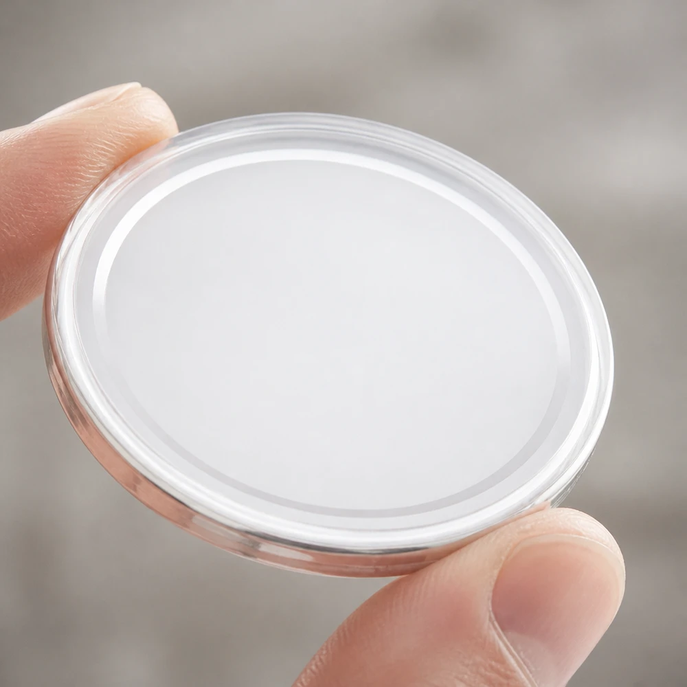 Couvercle TO82 BasicSeal de 82 mm, UNiTWIST, blanc, surface lisse, prêt à être scellé – gros plan