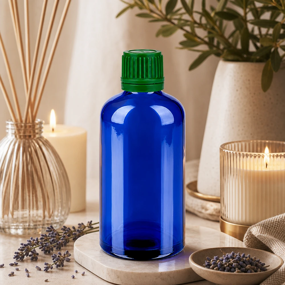 Flacon 100ml 11mm SV vert OV BlueLine UT18/100 Bouteille en verre soufflé 100ml d'un bleu profond avec un bouchon vert résistant à la corrosion