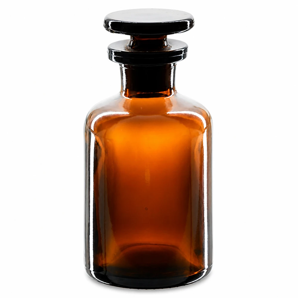 Flacon pharmaceutique 50 ml col étroit en verre ambré + bouchon Petite bouteille en verre ambré de 50 ml, à épaulement arrondi et col étroit, munie d'un bouchon plat en verre