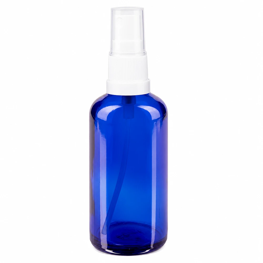 Flacon pulvérisateur en verre bleu de 50 ml avec tête de pulvérisation blanche, destiné aux pharmacies et aux produits cosmétiques