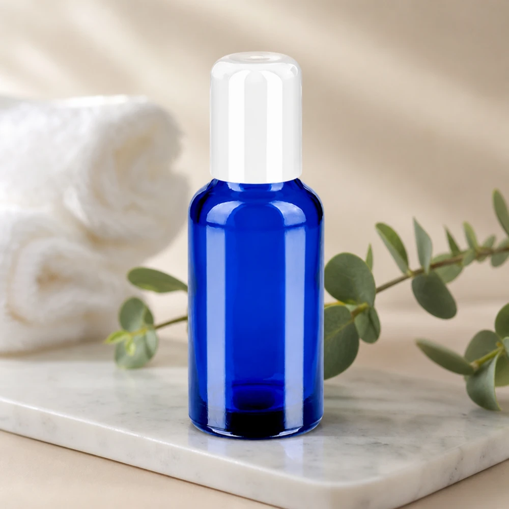 Flacon Roll-On 30ml blanc STD BlueLine UT18/30 Récipient roll-on de 30 ml d'un bleu intense avec bouchon blanc hygiénique pour un traitement ponctuel