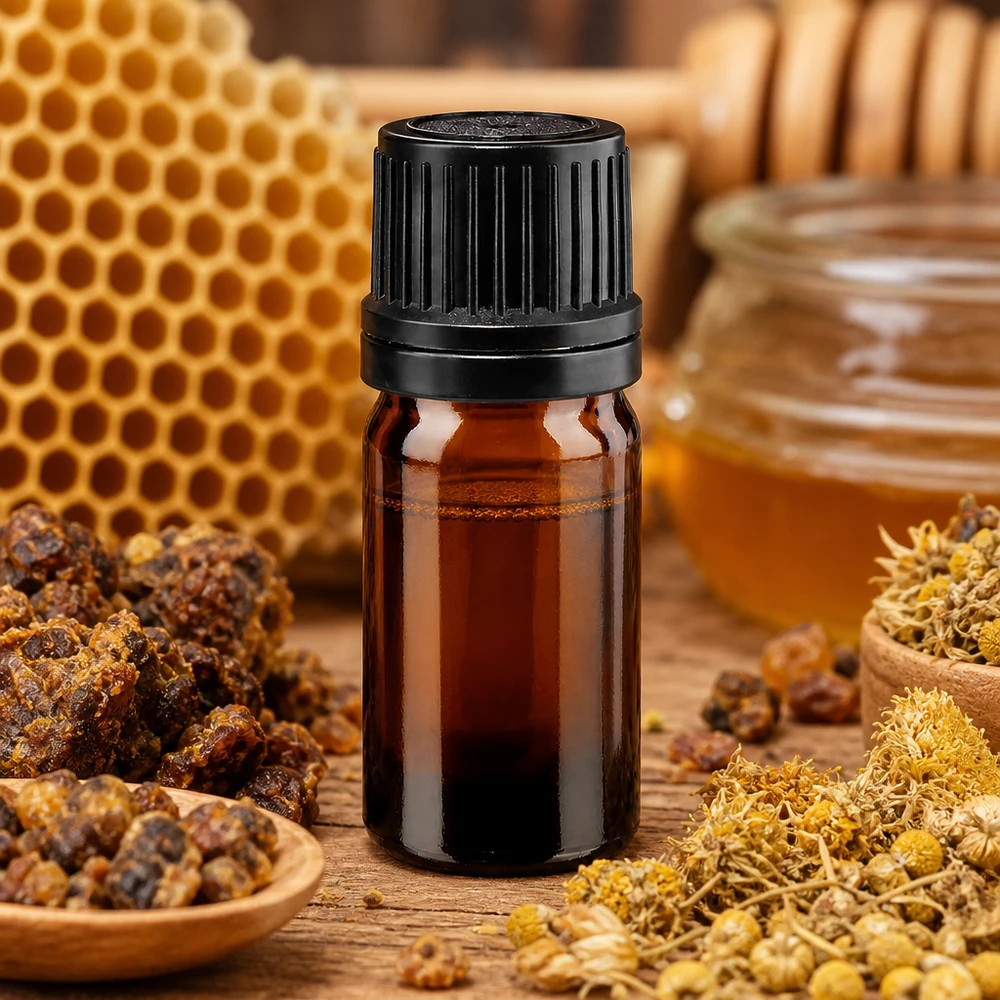 Flacon de pharmacie brun 5ml bouchon vissable noir bague de coulée bouchon d'inviolabilité Flacon en verre brun de 5 ml muni d'un bouchon OV, recouvert de propolis, de cire d'abeille et de fleurs de camomille