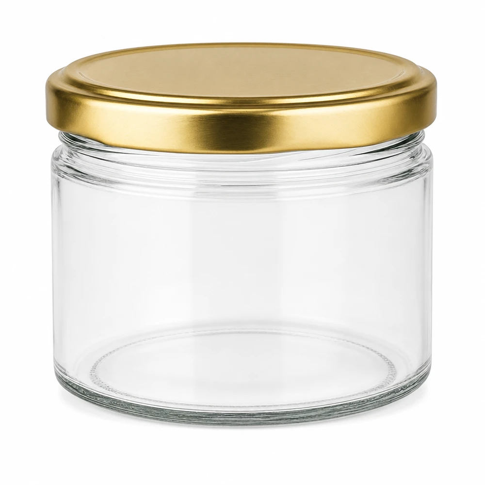 Verre rond vide de 540ml avec couvercle BasicSeal UNiTWIST doré sur fond blanc