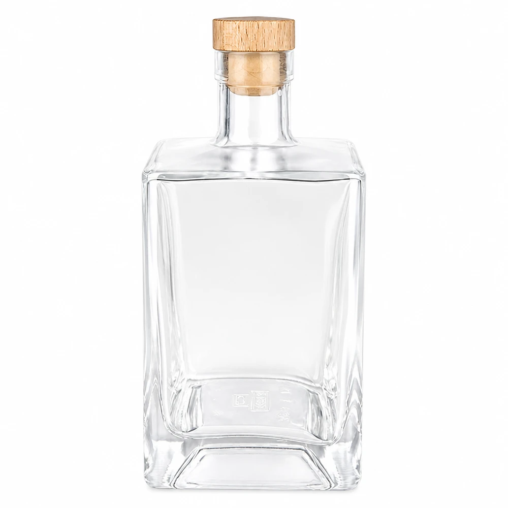 Bouteille en verre 700 ml « Ben » avec bouchon en bois UNiTWIST® Bouteille en verre Ben de 700ml avec bouchon à poignée en bois UNiTWIST transparent vide forme rectangulaire Bouteille de whisky pour spiritueux