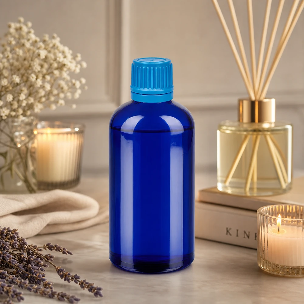 Flacon 100ml 11mm SV bleu OV BlueLine UT18/100 Bouteille en verre bleu robuste de 100 ml avec bouchon à vis de sécurité pour les enfants, pour une conservation sûre du produit