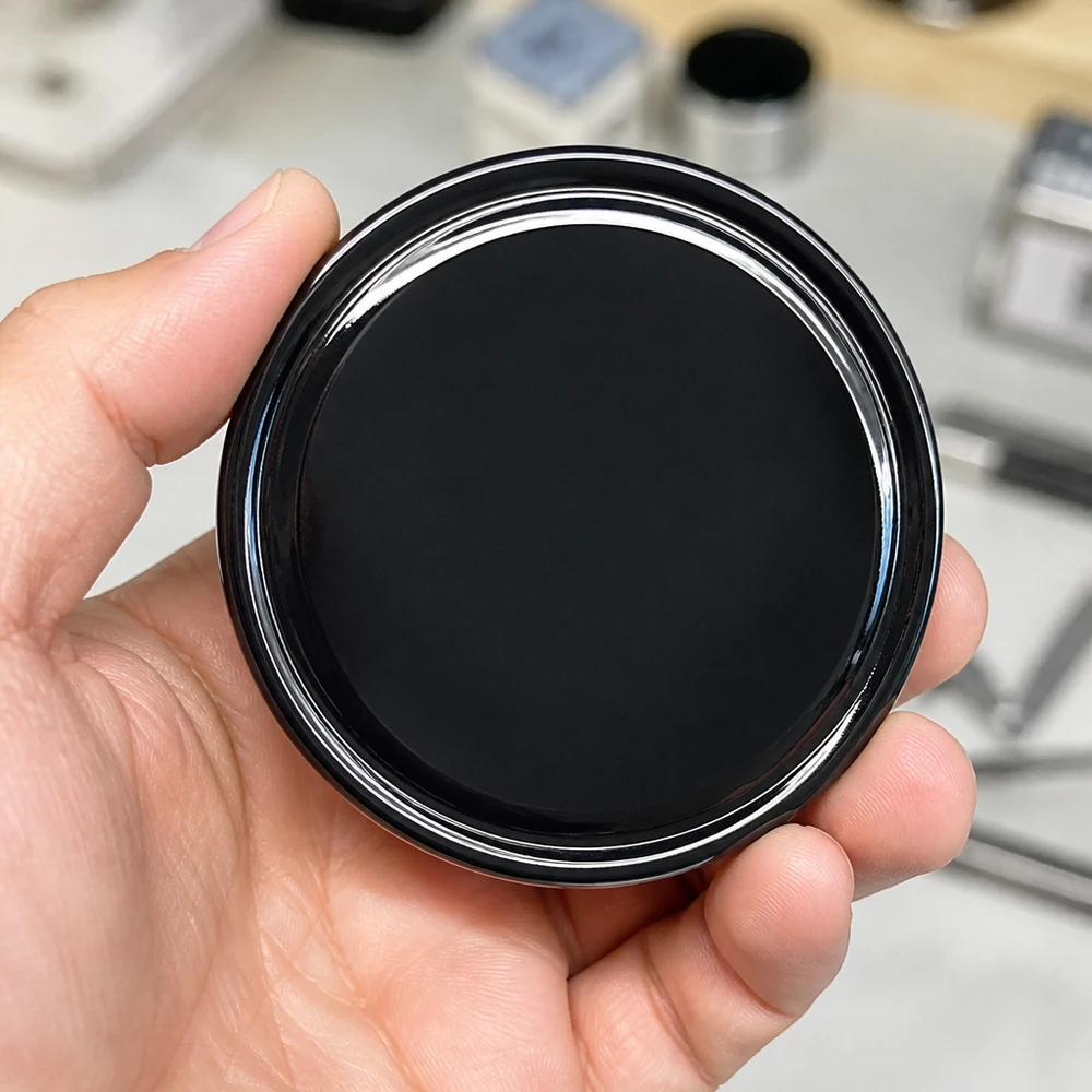 Couvercle BasicSeal 70 mm noir (TO70) UNiTWIST Couvercle rond TO70 BasicSeal 70 mm, noir mat brillant – UNiTWIST : détail du produit, gros plan