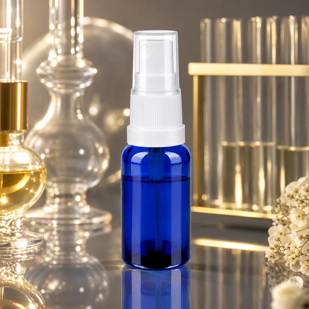 Vaporisateur 20ml blanc/tr. STD BlueLine UT18/20 Vaporisateur professionnel en verre de 20 ml avec protection contre les UV grâce à la coloration bleue et au vaporisateur blanc
