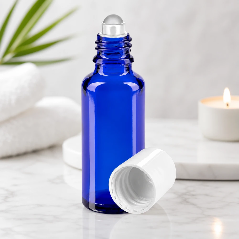 Flacon de pharmacie bleu 30ml Roll-On bouchon blanc Flacon en verre d'apothicaire bleu cobalt de 30 ml, muni d'un bille-rouleau pour une application précise des essences de soin