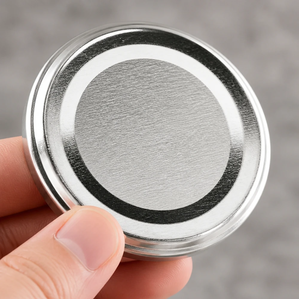 66mm BasicSeal bouchon argenté (TO66deep) UNiTWIST Vue détaillée de la bague d'étanchéité noire sur le couvercle BasicSeal argenté de 66 mm TO66deep UNiTWIST