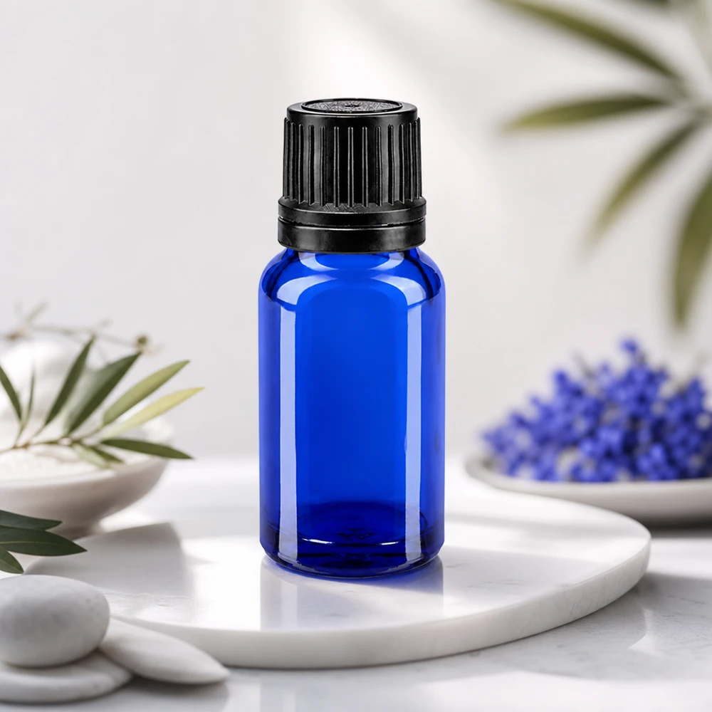 Flacon de pharmacie bleu 10ml bouchon inviolable blanc 1mm bouchon inviolabilité Flacon en verre avec protection UV, 10 ml, bleu cobalt, muni d'un bouchon d'inviolabilité noir, destiné aux cosmétiques naturels