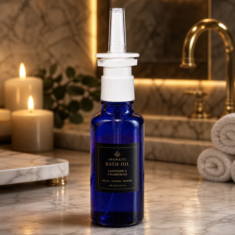 Flacon en verre pharmaceutique de 30 ml, bleu, muni d'un vaporisateur doseur blanc, destiné à un usage nasal