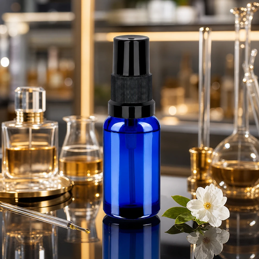 Vaporisateur 20ml noir STD BlueLine UT18/20 Vaporisateur Premium BlueLine 20ml avec protection UV grâce au verre bleu et à la tête de vaporisation ergonomique