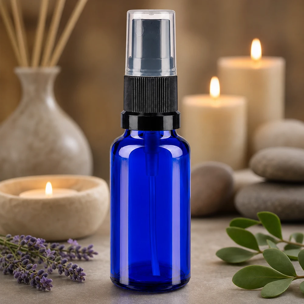 Petit vaporisateur de 20 ml en verre bleu avec pompe noire et bouchon transparent, pour parfums d'ambiance