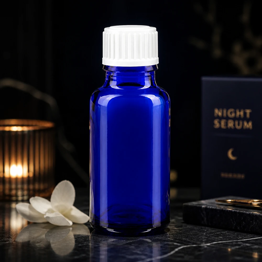 Flacon à pharmacie bleu 20ml bouchon à vis blanc standard Flacon de pharmacie de 20 ml en verre bleu avec bouchon blanc à sécurité enfant, destiné aux soins de nuit et aux produits cosmétiques