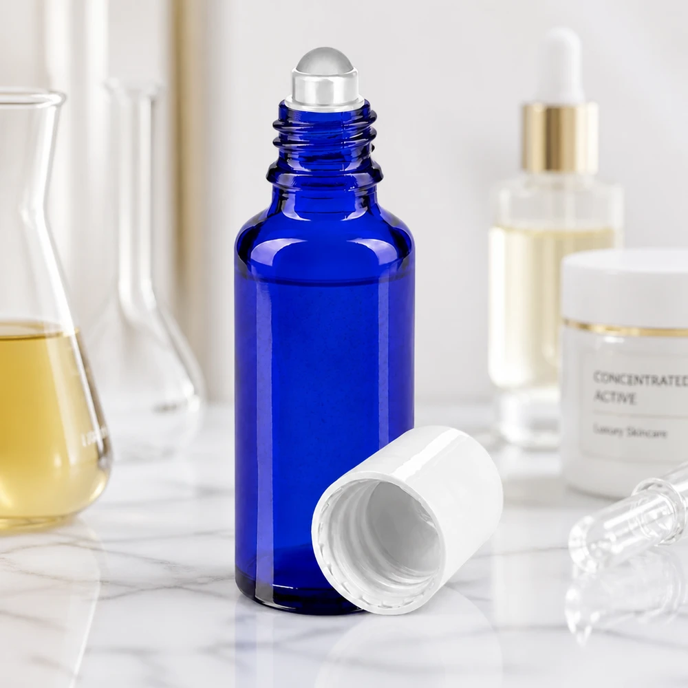 Flacon bleu cobalt de 30 ml avec applicateur à bille pour huiles essentielles et parfums