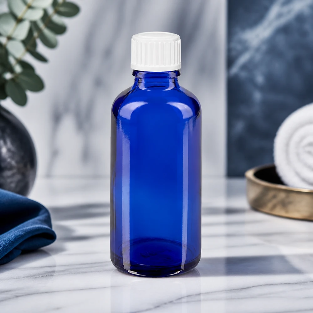 Flacon de pharmacie bleu de 50 ml avec compte-gouttes de 0,9 mm et bouchon à vis blanc à l'épreuve des enfants