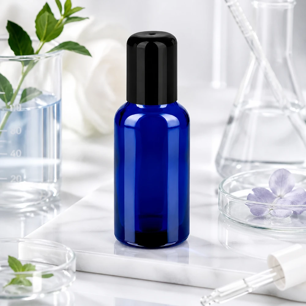Flacon Roll-On 30ml noir STD BlueLine UT18/30 Bouteille de protection solaire Roll-On 30ml STD BlueLine UT18/30 en bleu cobalt anti-UV