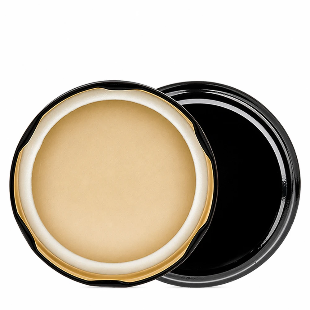 Couvercle BasicSeal TO82 UNiTWIST de 82 mm, ouvert, laissant apparaître une masse de scellage de couleur crème et un bord doré