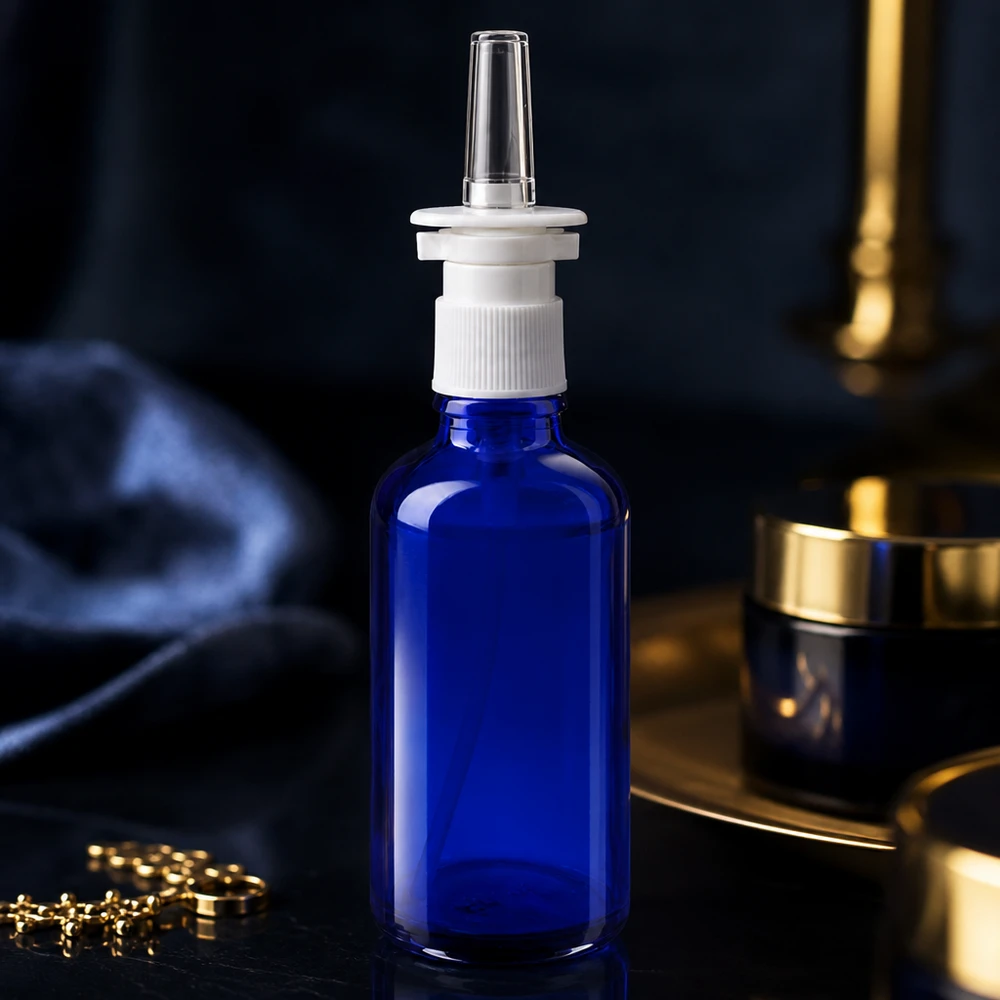 Flacon pulvérisateur pharmaceutique de 50 ml en verre bleu avec embout applicateur transparent, modèle standard